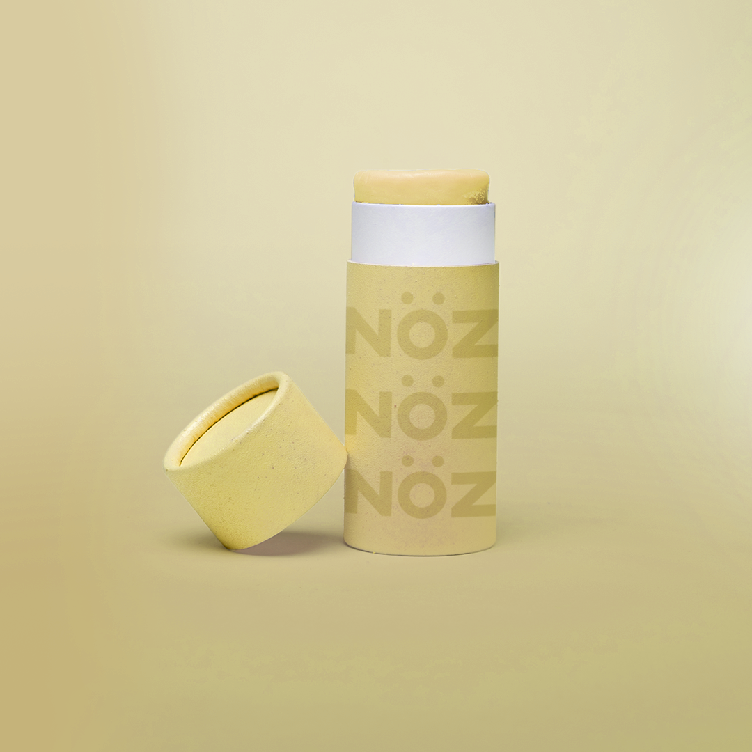 Nöz vibrant yellow "Shady Where" tube of cruelty-free and vegan sunscreen